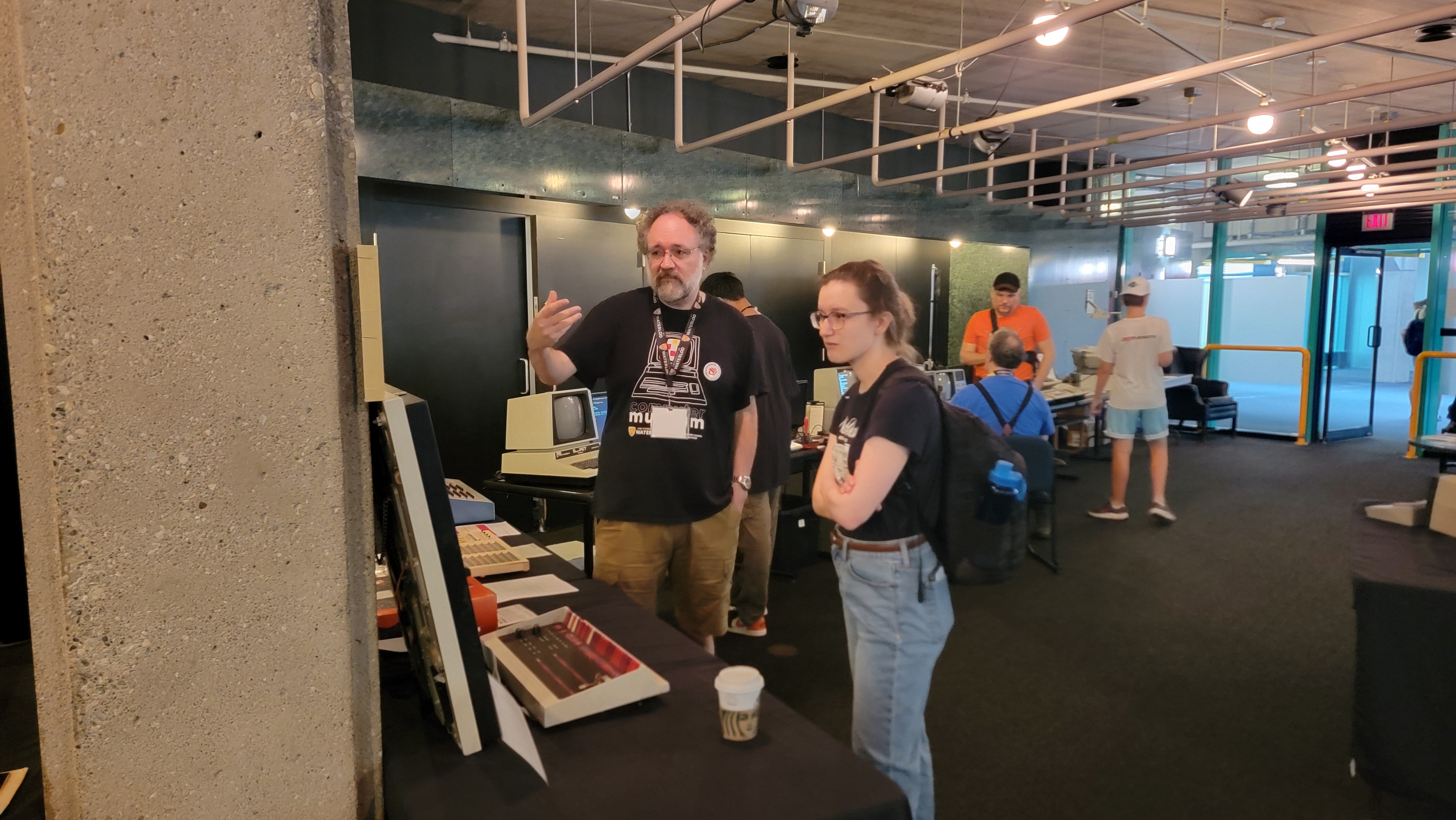 Scott discusses Tape Drive with visitor