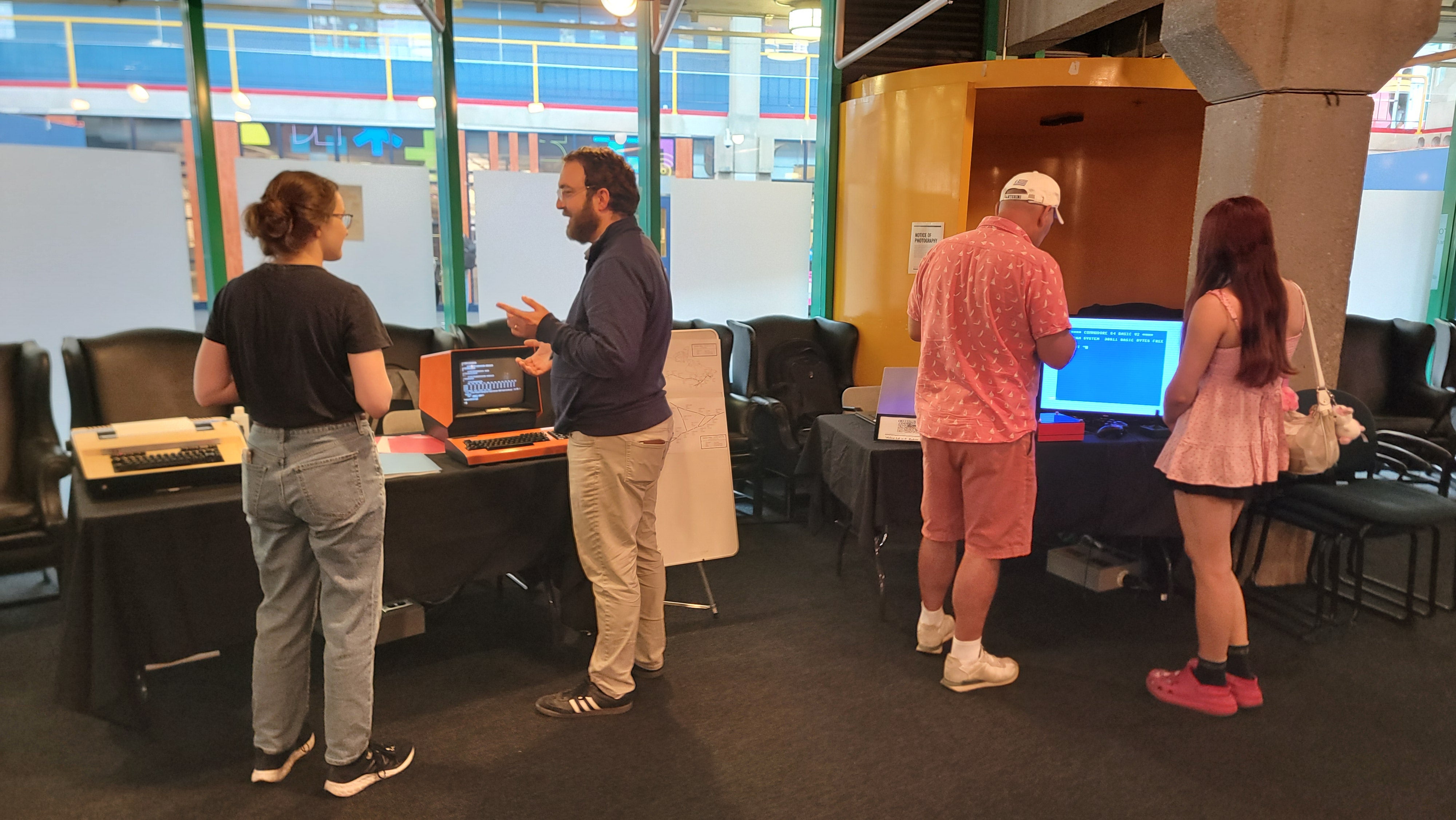 Visitors at Justus' exhibit