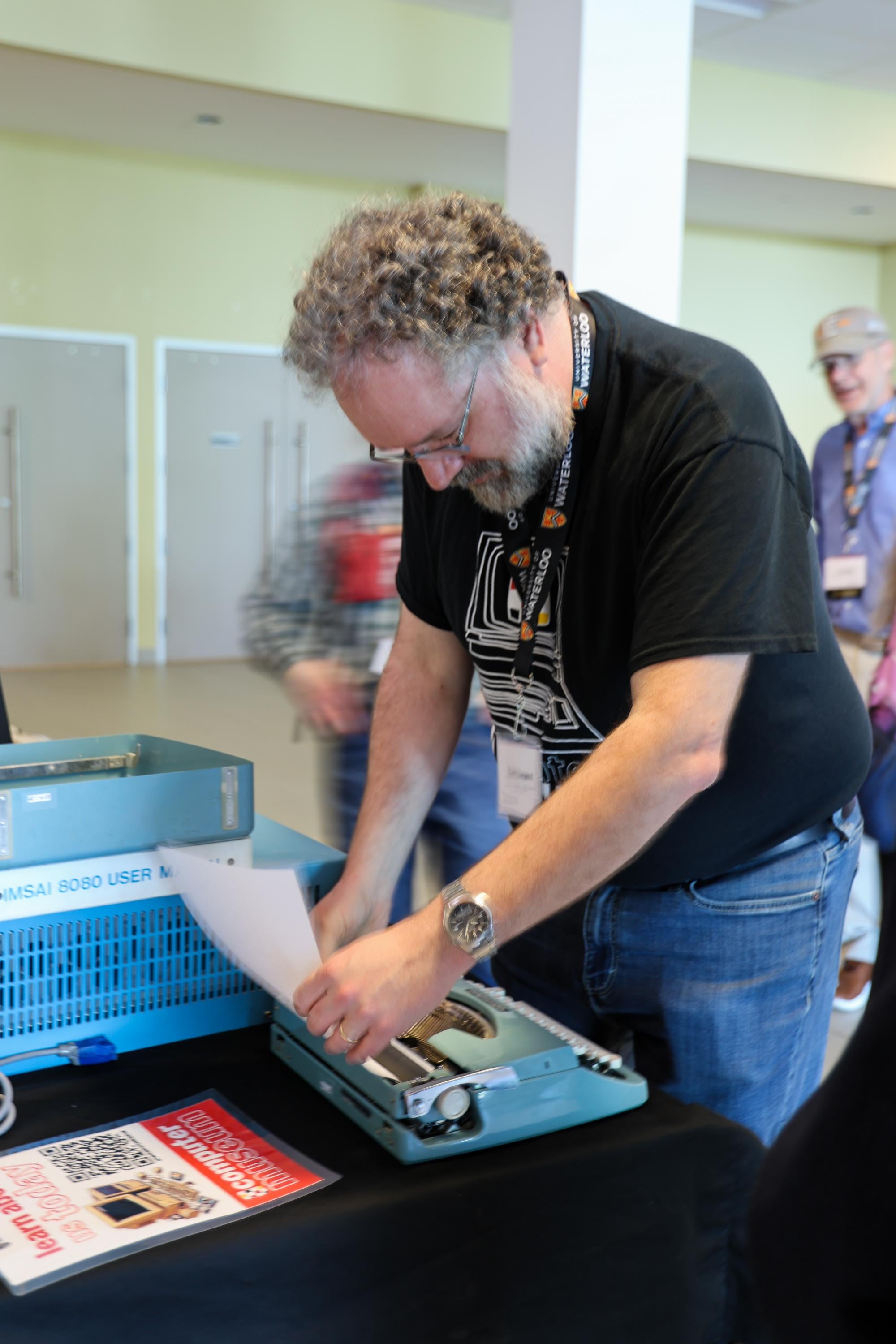 Curator Scott Campbell demonstrating a Brother manual typewriter