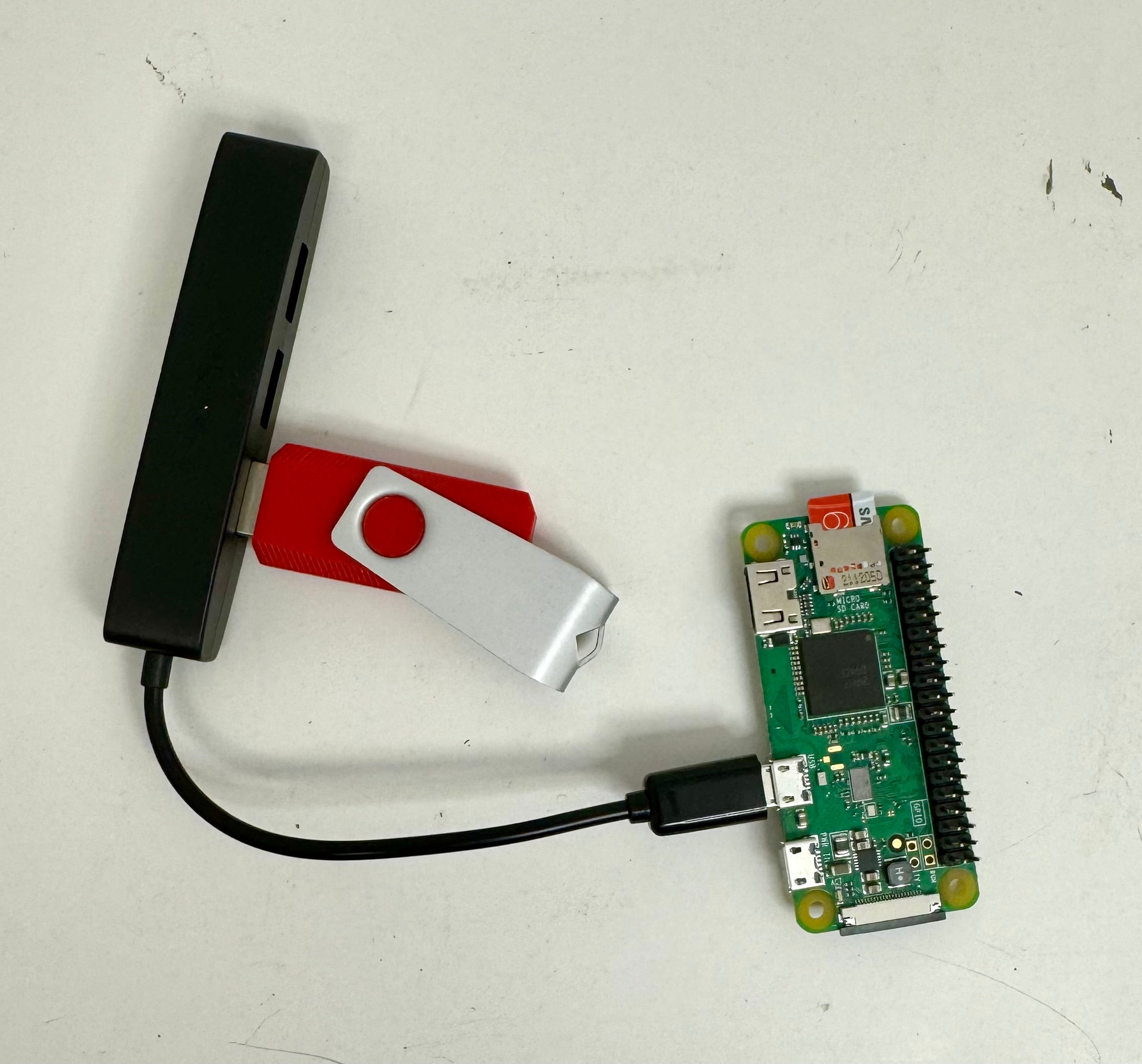 USB stick plugged directly into the Pi with an micro-usb adaptor