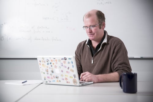 Professor Jesse Hoey on a laptop