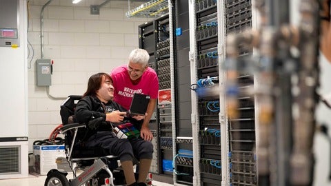 Professor Martin Karsten and Peter Cai in server room