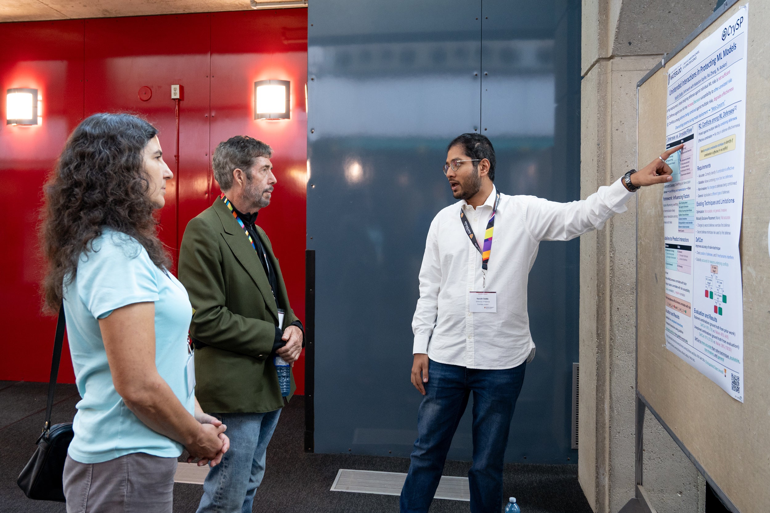 Vasisht Duddu presenting his poster at 2025 Cheriton Research Symposium