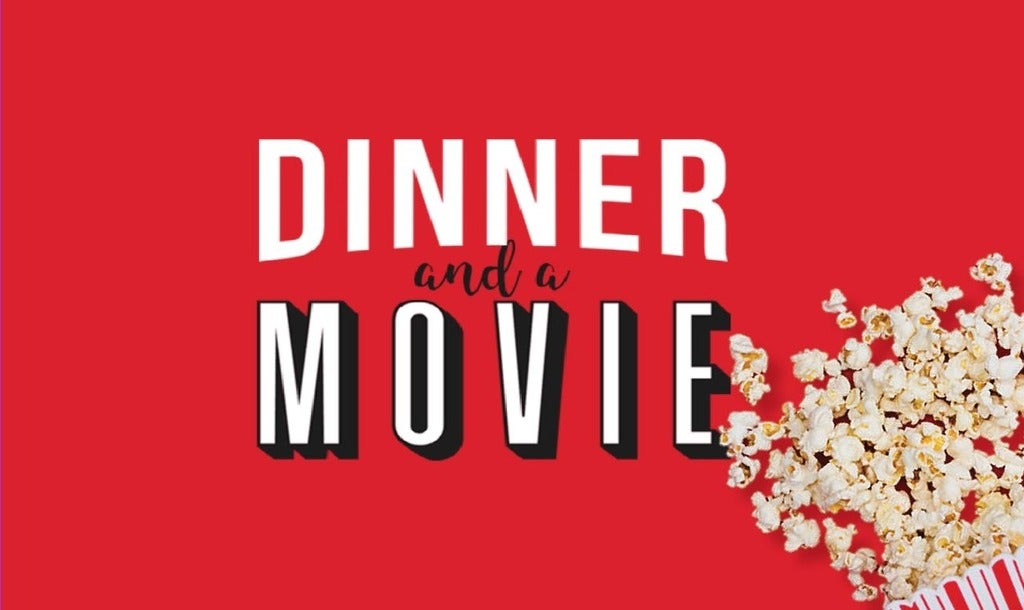Dinner and a movie poster with spilled popcorn