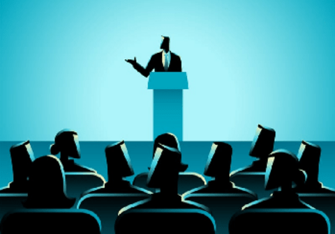 Person giving a presentation in front of audience