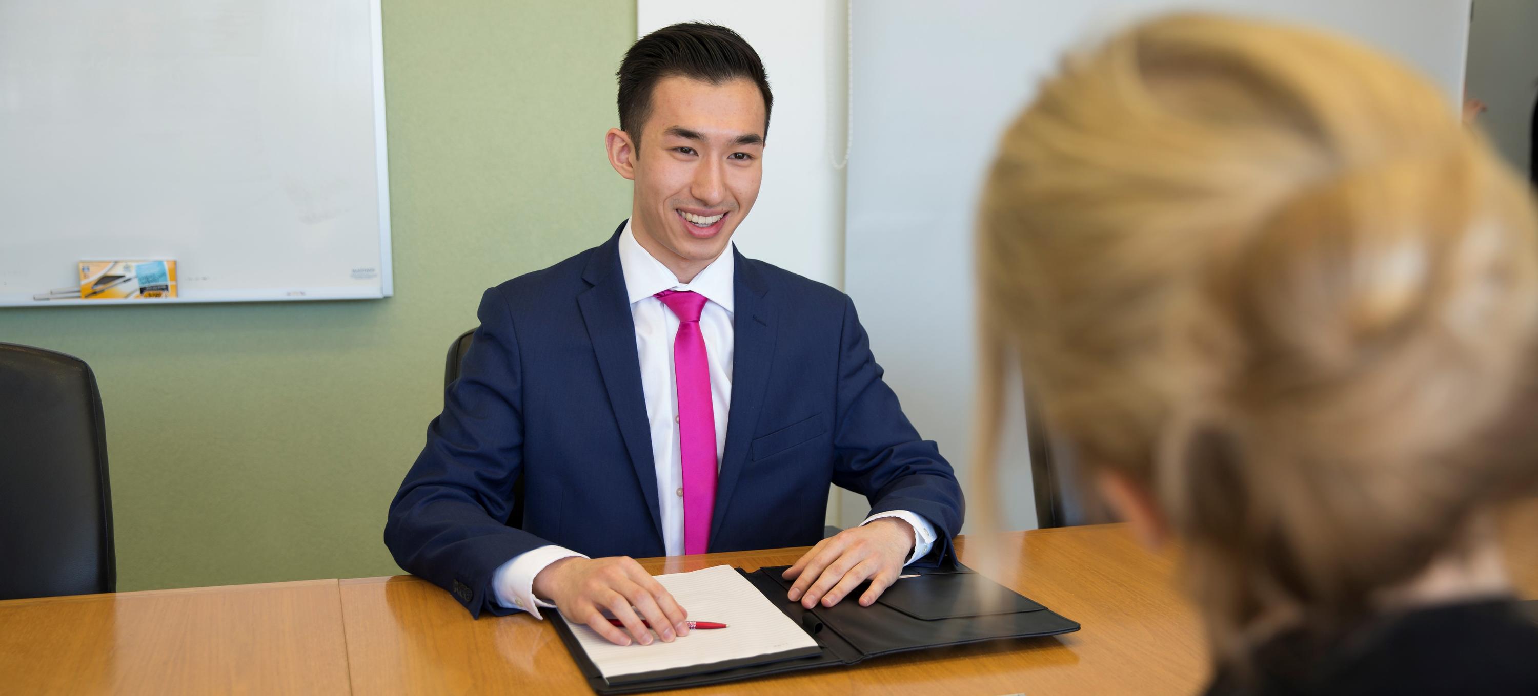 Male CFM student interviewing for a job