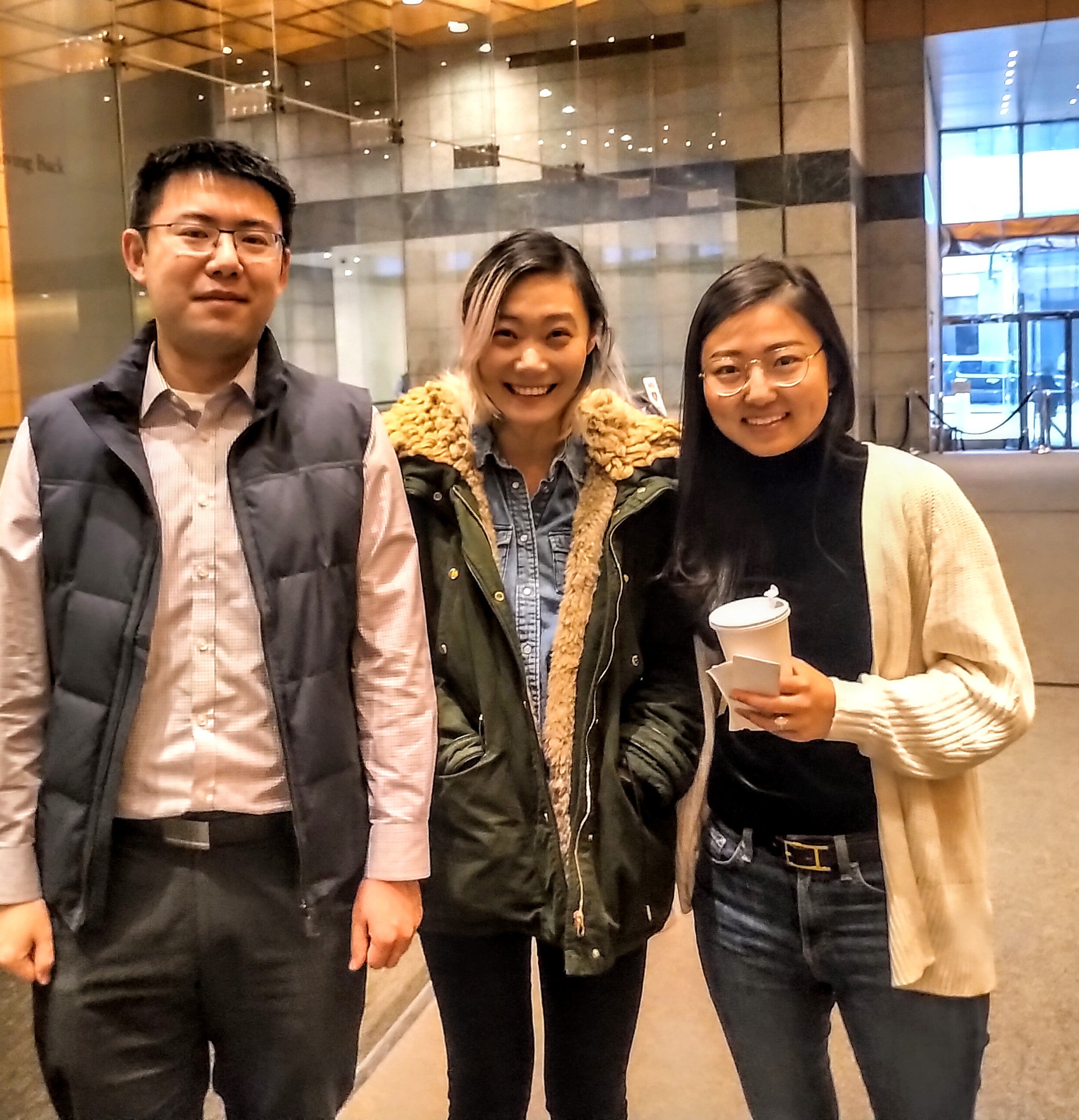 Three alumni drinking coffee