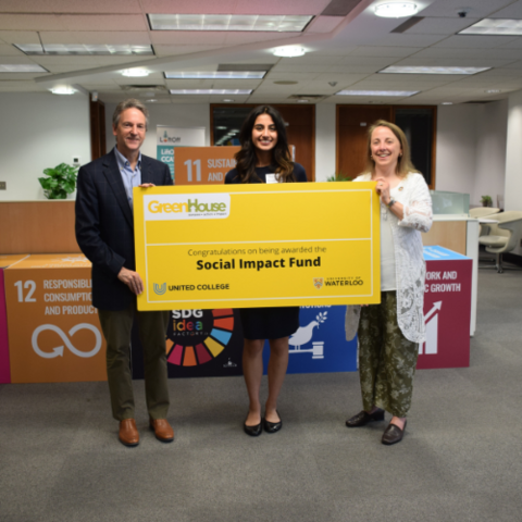 Neha Grewal (MBET '23) poses with her cheque from winning at the Social Impact Showcase