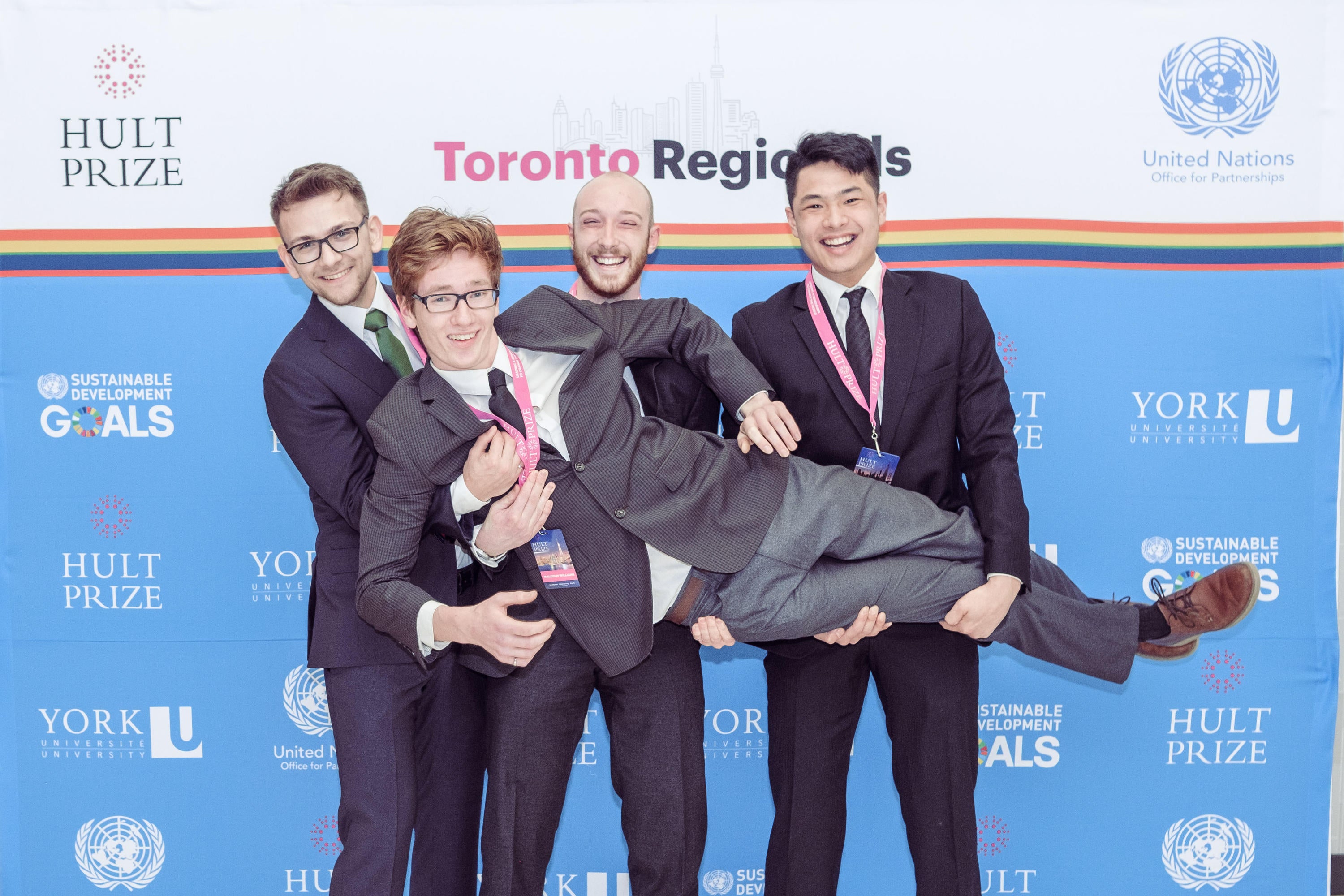 John Curticapean, Malcolm Williams, Benjamin Hudson, and Tony Qu at the Hult Prize Regional in Toronto, Canada.