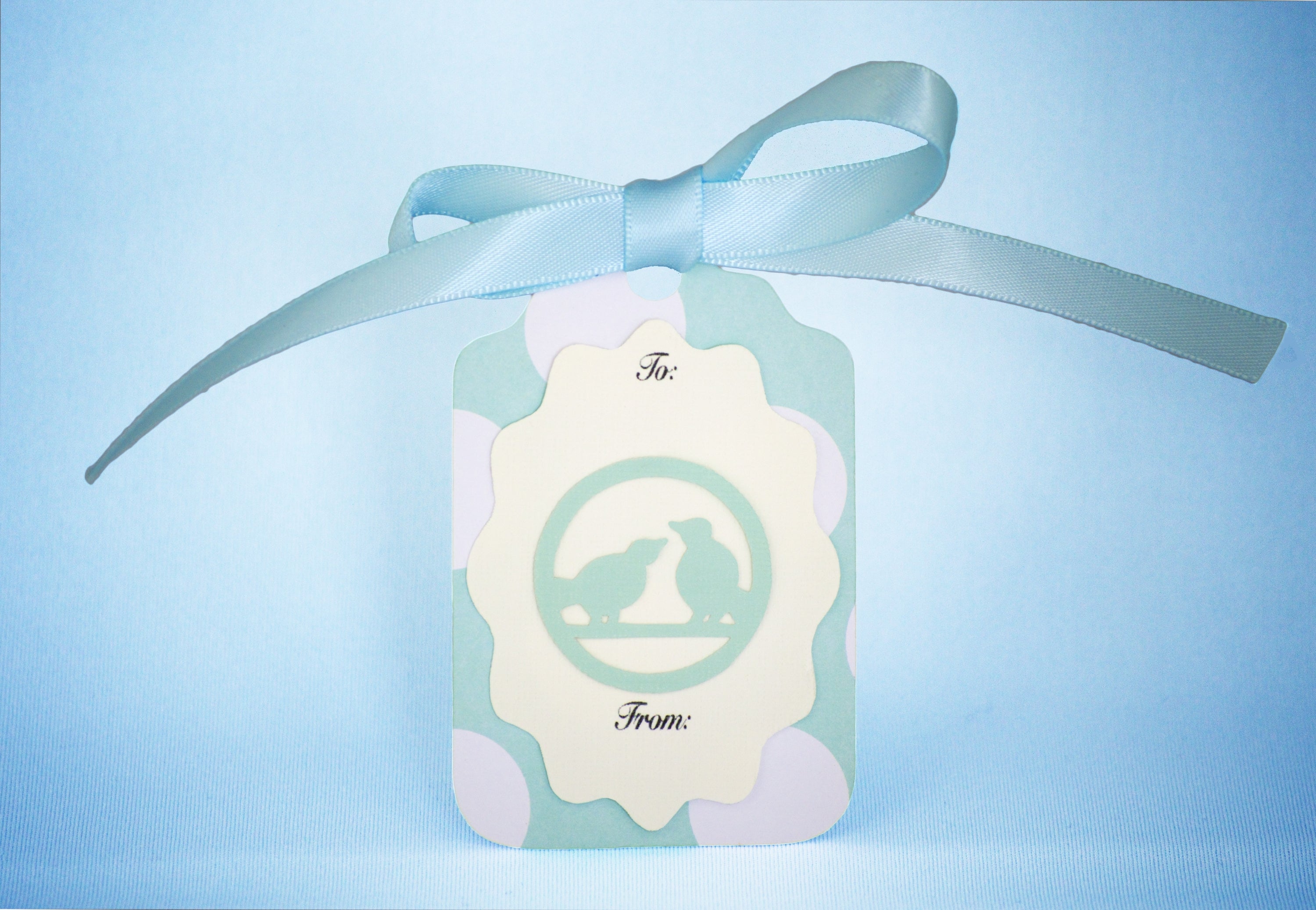 Blue gift tag with love birds