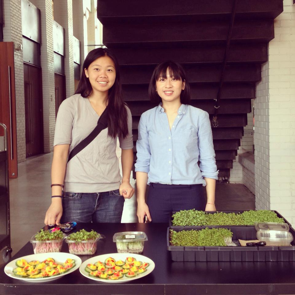Victoria Suen and Carrie Cheng with produce