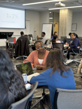 MBET students in the classroom during a discussion