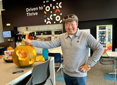 Kevin Ye with pumpkin