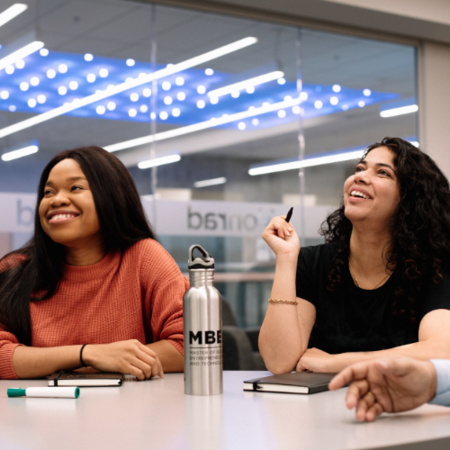 Two MBET students in the classroom