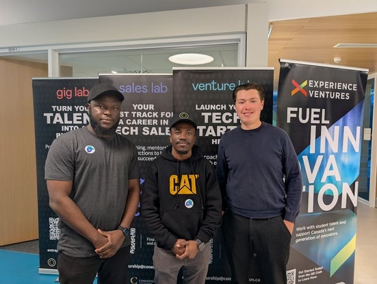 MBET student Joshua Olonade, Tom Kizito, and Charles Huxley