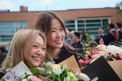 Grads in reception area