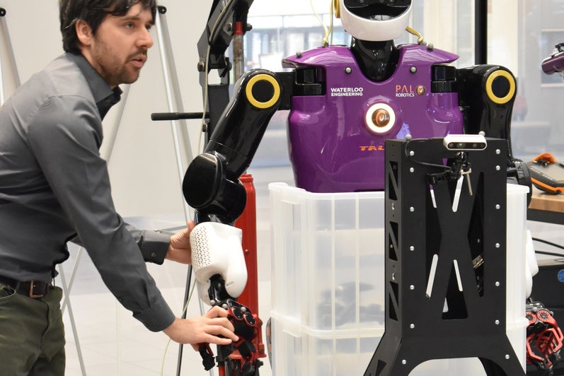 Robot with researcher