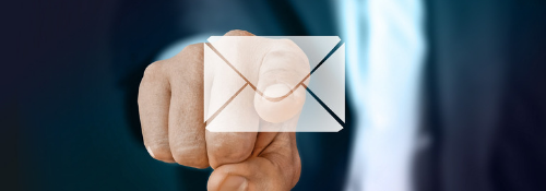 Finger pointing at email icon
