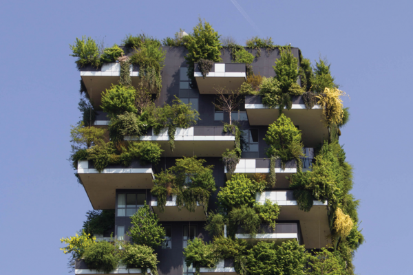 Modern apartment building with plants