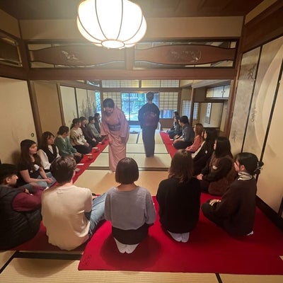 Students participate in a tea ceremony. 