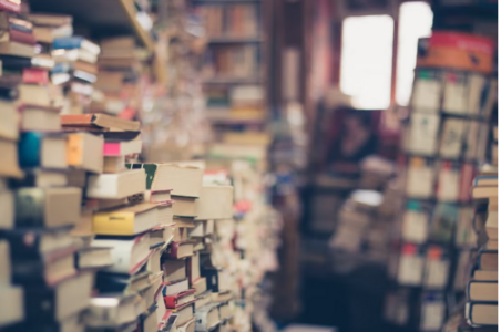 Blurry photo of stacked books