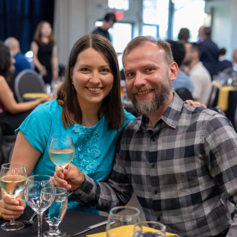 Two attendees at the PhD graduates celebration