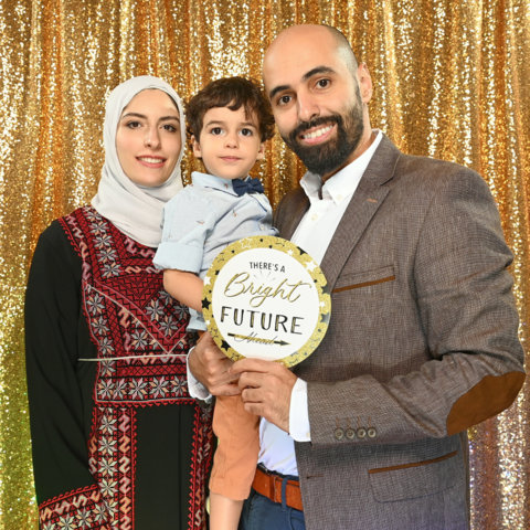 Family at the PhD grad celebration in the photobooth