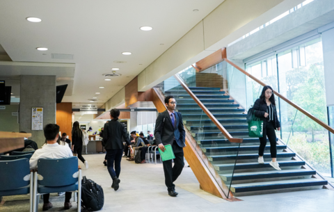 Students walking in Tatham Centre