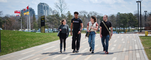 Students walking together on campus main path