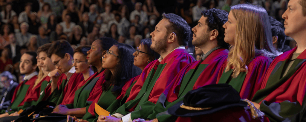 PhD graduates sitting at convocation