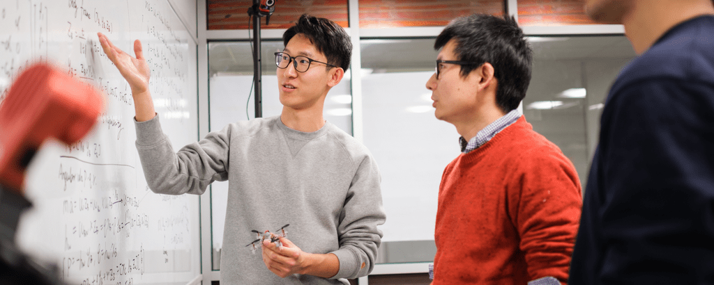 Students working on equations