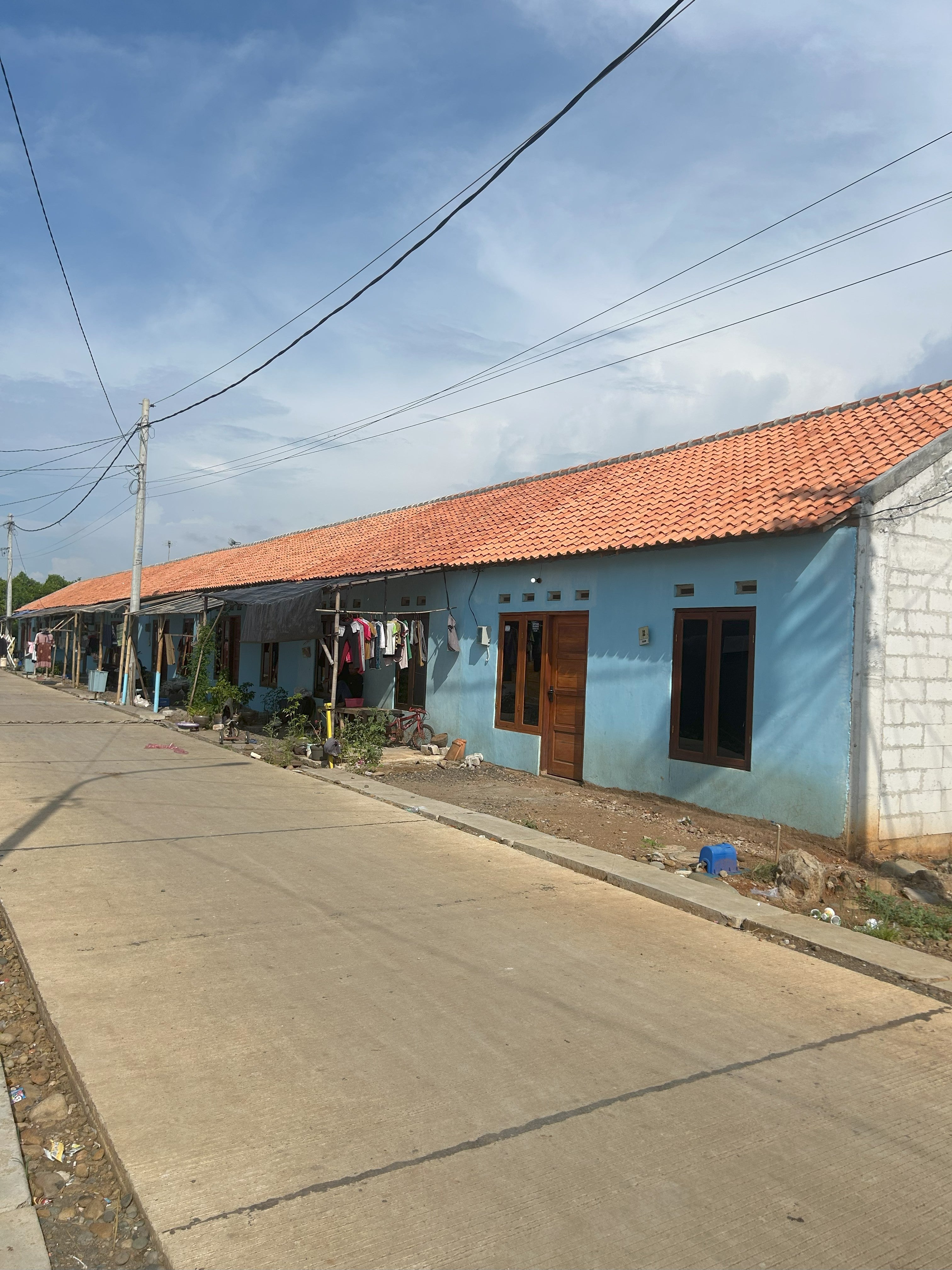 Blue building with orange roof 