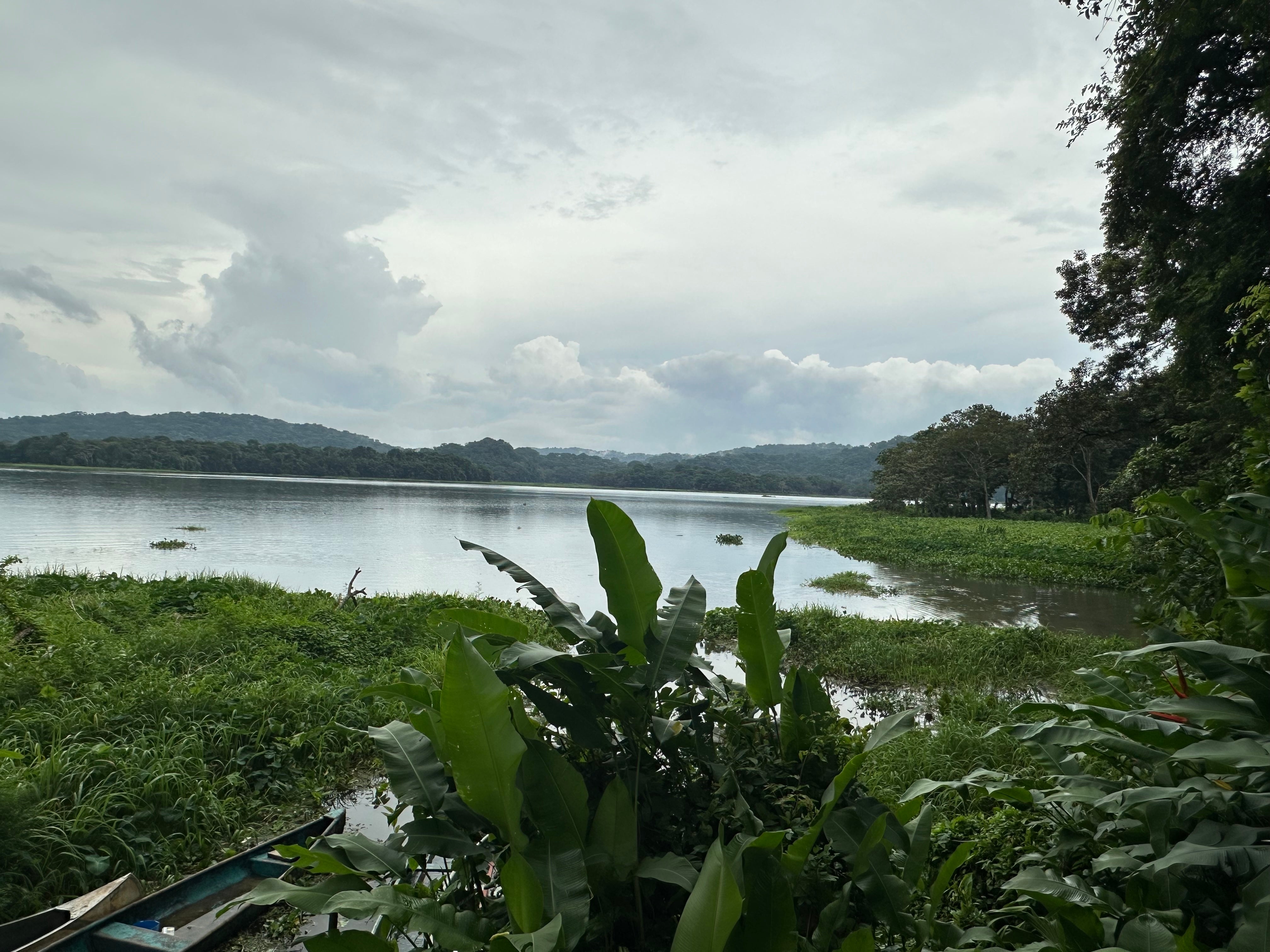 A landscape in Panama featuring a lake with hills in the background.