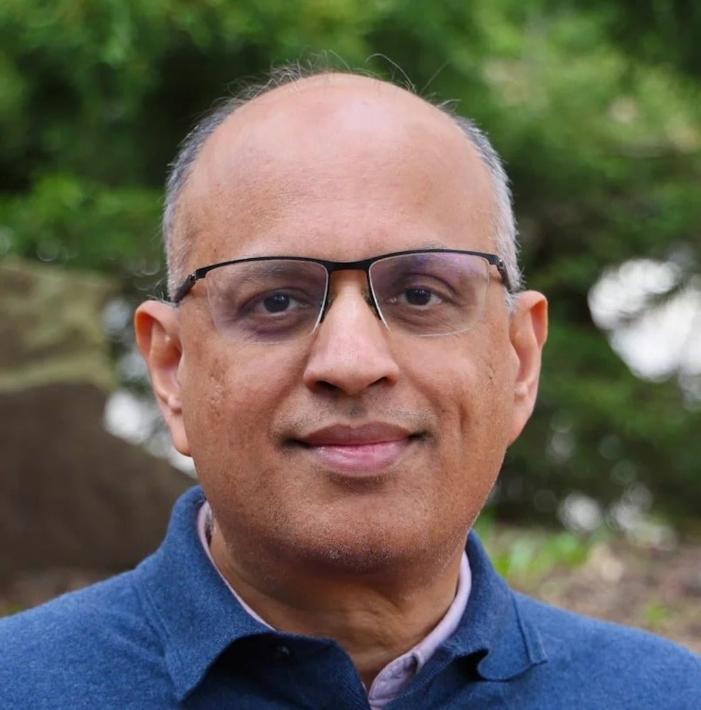 headshot of Alfred Menezes