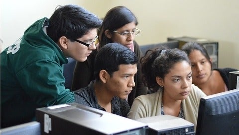 Group of students working on computer