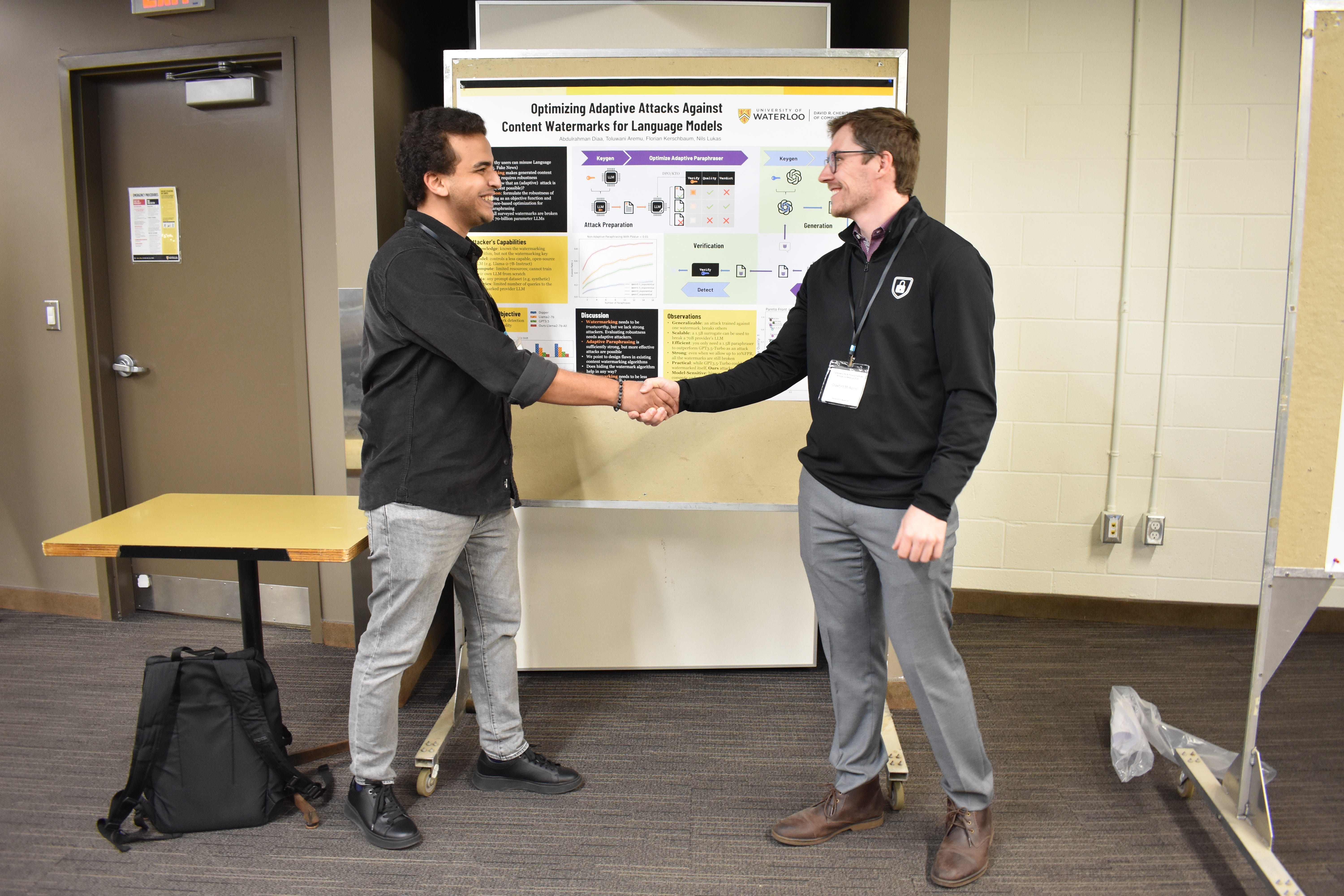 Abdulrahman Diaa shaking hands with a competition judge