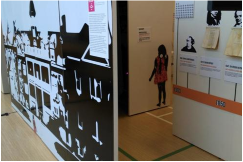 The Mashkawizii exhibit, with panels to walk between outlining the history of Canada's residential school system.