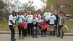 Volunteers from Marketing and Undergraduate Recruitment clean up campus.
