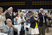 Audience members applaud during the 25, 35, and 45-Year Club celebration.