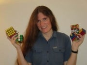 Matilde Lalin holding Rubik's cubes