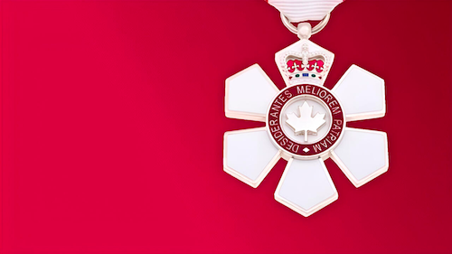 The Order of Canada medal against a red background.