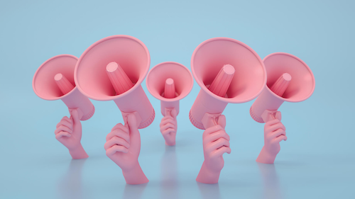 A chorus of five pink hands holding pink megaphones