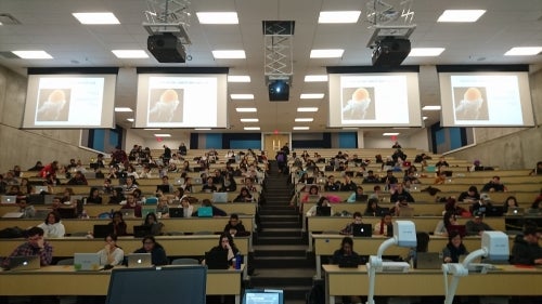 Students gather in the new Science Teaching Complex lecture theatre.