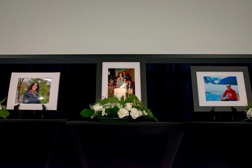 Photos of the deceased at the memorial event.