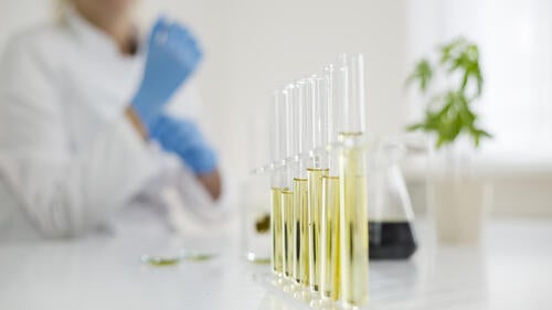 Synthetic cannabidiol vials in a lab.