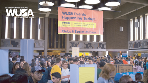 Clubs and Societies Days activity in the SLC Great Hall with students and booths.