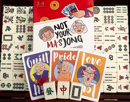 The board game box, cards and playing pieces for &quot;Not Your Ma's Jong.&quot;