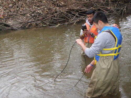 Students collect data in Laurel Creek.