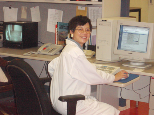 Doris Tom works at a PC circa 2003.