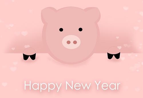 A cartoon pig and the words &quot;happy new year.&quot;